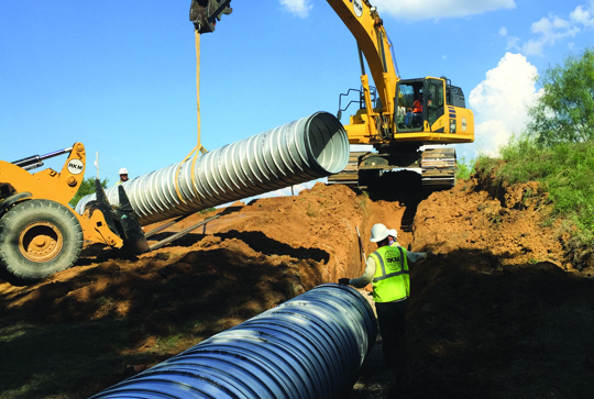 Installation of ULTRA FLOW corrugated metal pipe.