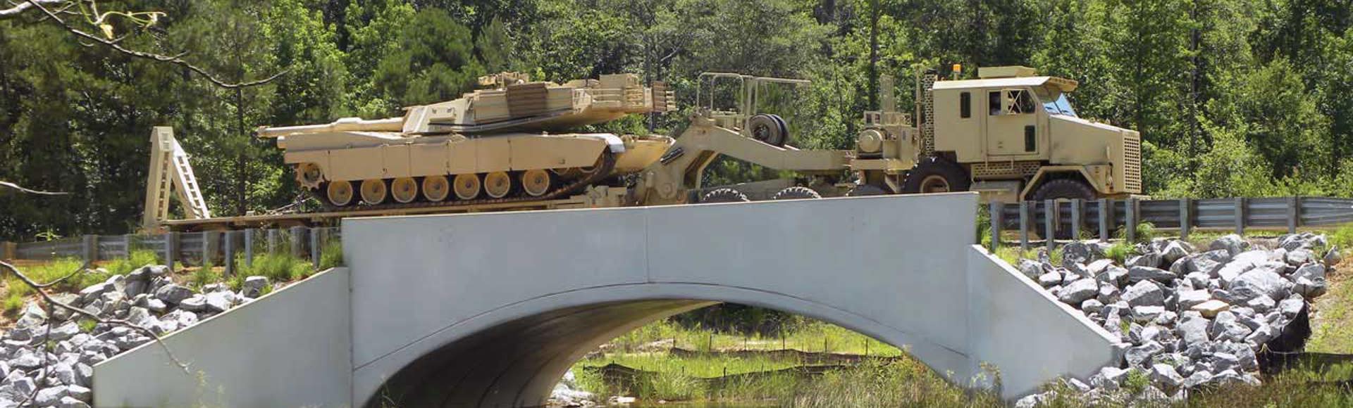 A CON/SPAN B-Series precast modular bridge at a military installation. 