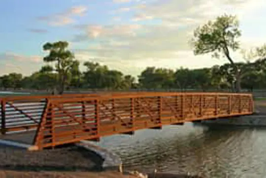 Continental pedestrian bridge over a river.