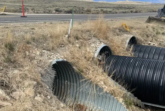 A culvert being relined with DuroMaxx steel reinforced polyethylene (SRPE) pipe.
