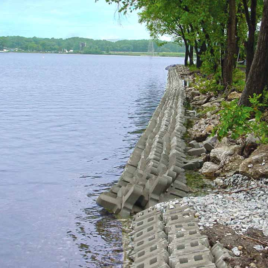 A-Jacks concrete armor units protect a lake embankment from erosion.
