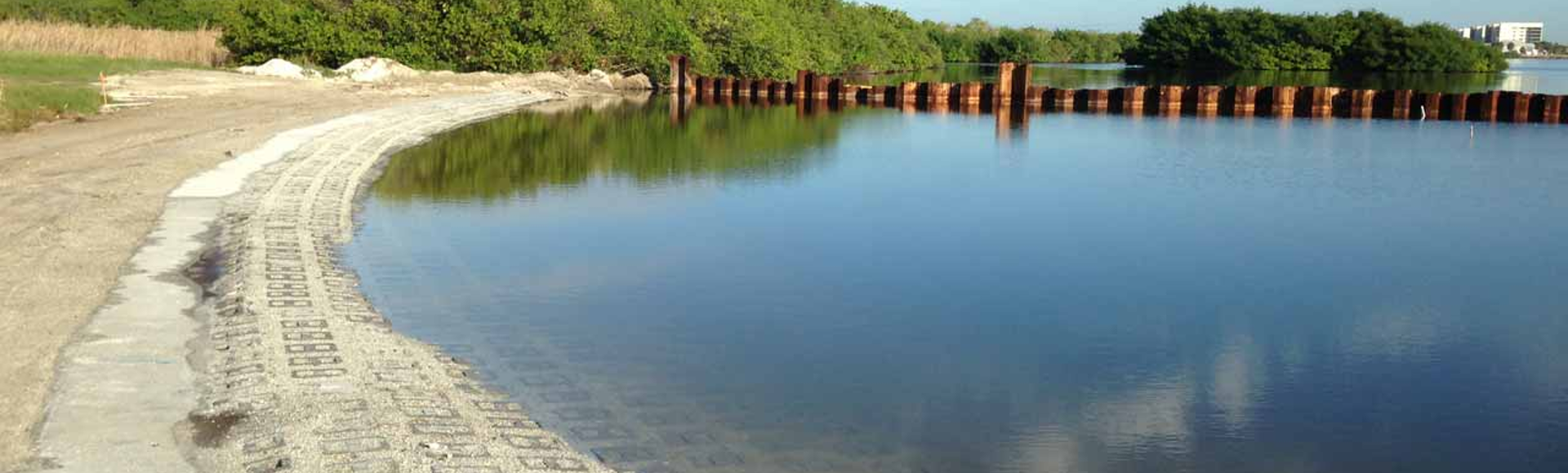  ArmorLoc concrete interlocking blocks protect a lake embankment from erosion. 