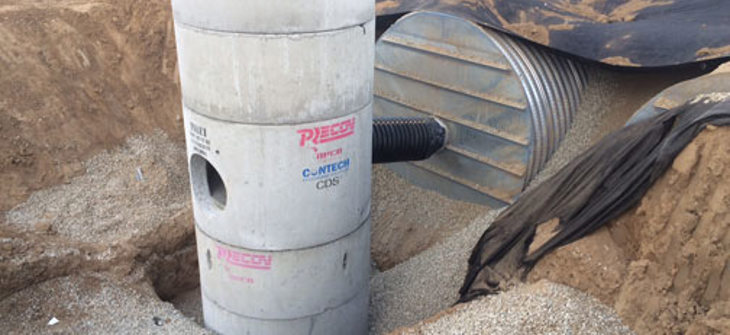 A CDS hydrodynamic separator pretreating a corrugated metal pipe stormwater detention system.