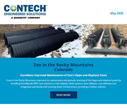 Black plastic pipes and pool filtration equipment are shown outdoors at a zoo under maintenance in the Rocky Mountains.