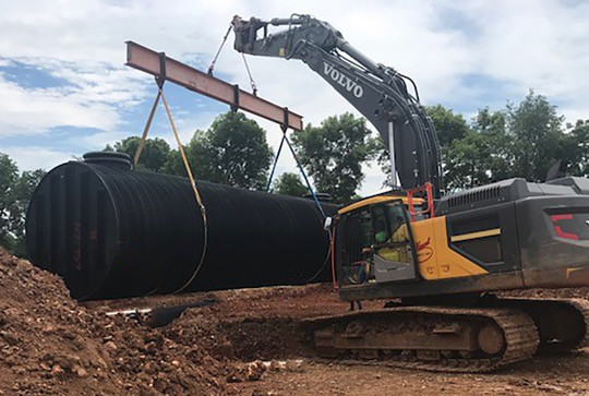 Lightweight DuroMaxx SRPE tank being lifted in the air.