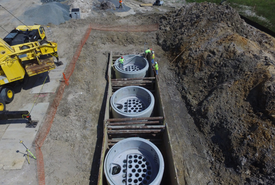Installation of three Jellyfish stormwater filtration devices. 