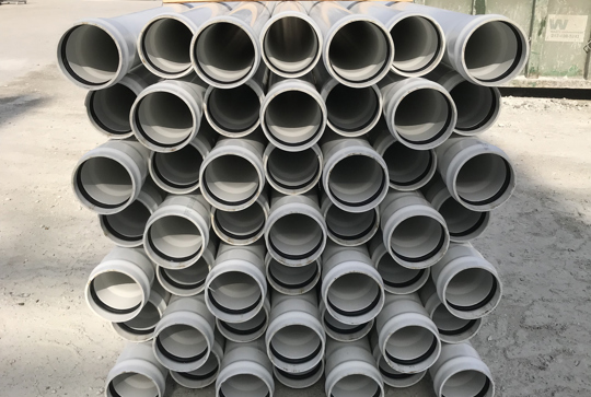 A stack of Solid Wall PVC pipe. 