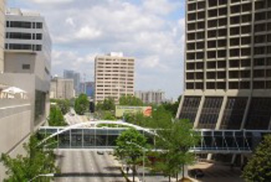A Continental pedestrian bridge over a highway.
