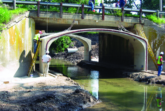 An bridge being construed using the CON/SPAN precast modular bridge system.